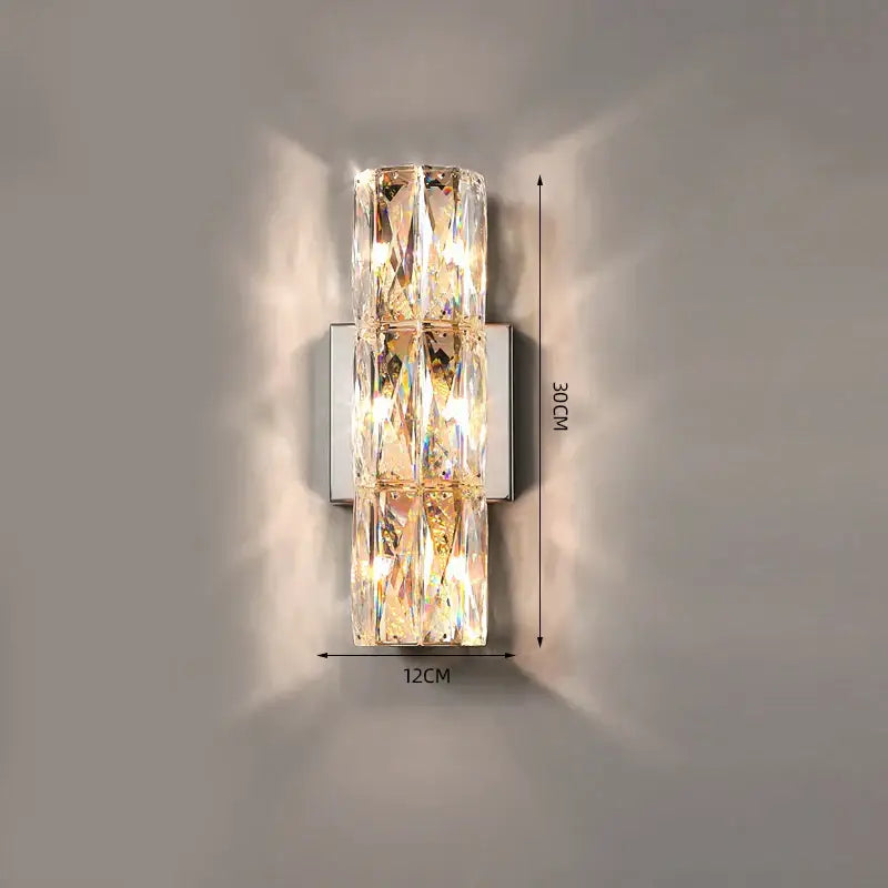 Luxury silver crystal wall sconce with faceted crystal segments and polished chrome base for living room decorbites crystal deluxe