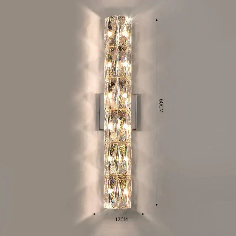 Luxury silver crystal deluxe wall sconce with clear faceted crystals and illuminated central column for living room decorbites