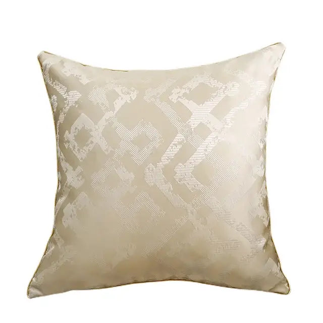 Beige luxury cushion cover with subtle lighter beige geometric pattern made from silver quilted jacquard fabric