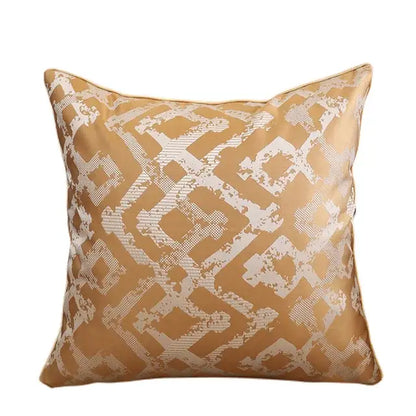 Gold-toned luxury cushion cover with white geometric pattern in textured jacquard fabric for bedroom use