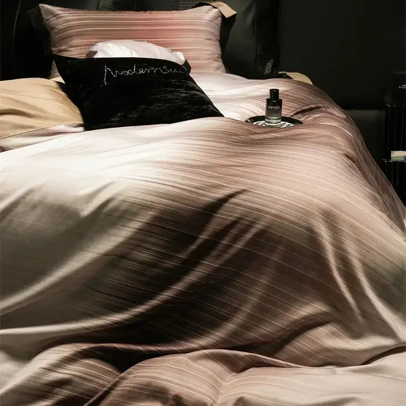 Luxury taupe satin duvet cover with subtle vertical stripes and soft sheen in a lyocell cotton bedding set by decorbites light luxury