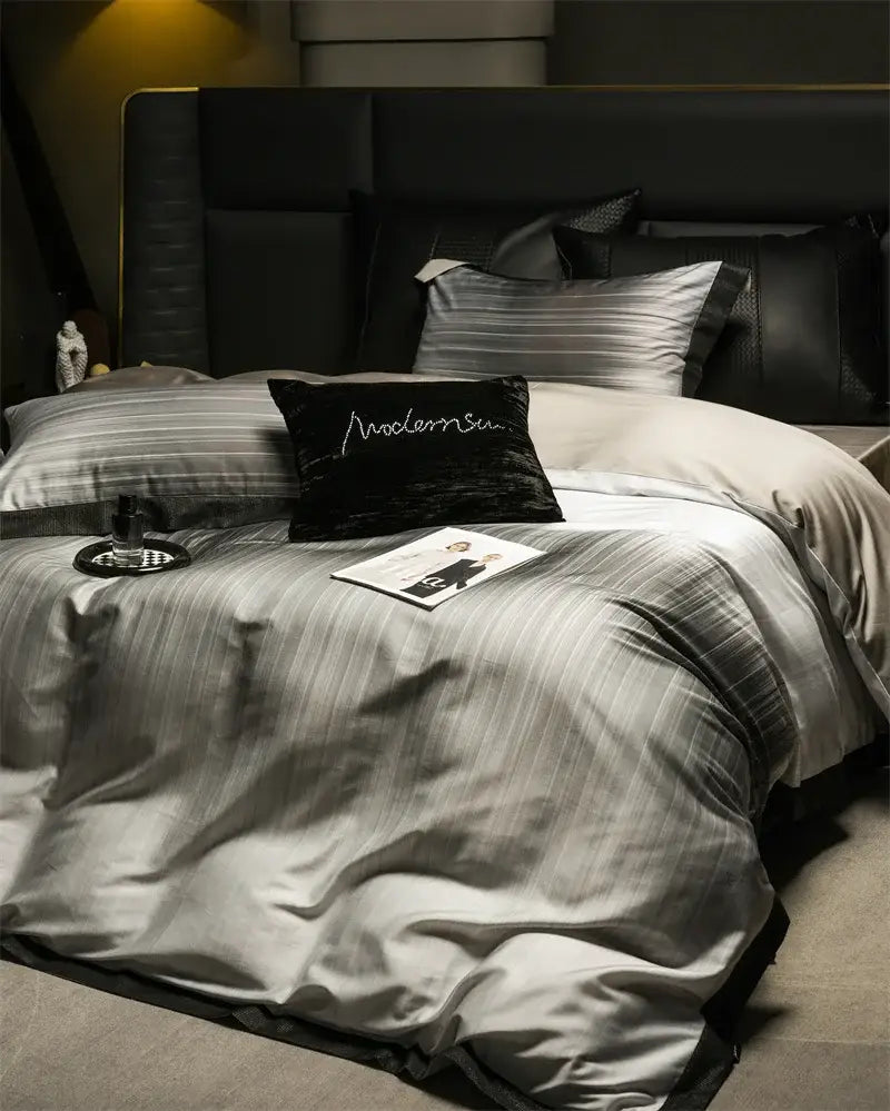 Silver-striped satin duvet cover bedding set with black velvet accent pillow in taupe beige lyocell cotton decorbites light luxury