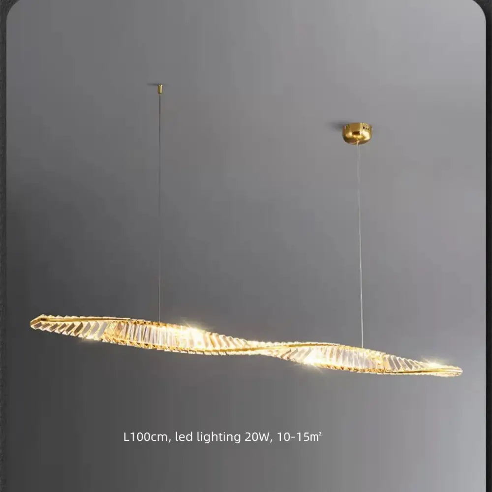 A modern 100cm wall lamp with sleek gold finish and twisted design featuring decorbites crystal gold accents