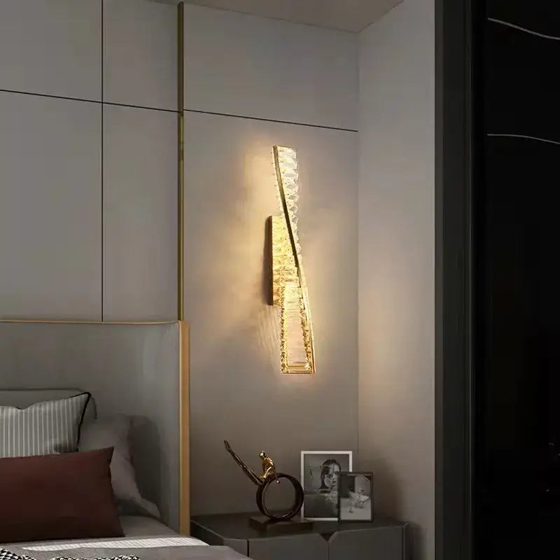 Gold-toned decorbites crystal gold wall lamp with textured crystals creating warm light for living room decor