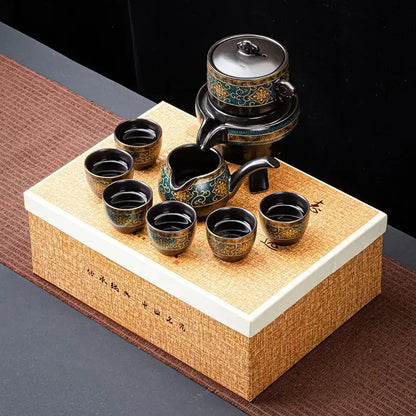 Luxury turquoise and gold black ceramic kung fu tea set with intricate floral patterns including teapot and cups
