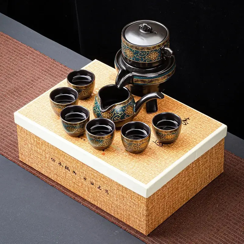 Luxury turquoise and gold black ceramic kung fu tea set with intricate floral patterns including teapot and cups