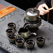 Luxury turquoise and gold black ceramic kung fu tea set with intricate floral patterns for dining room use