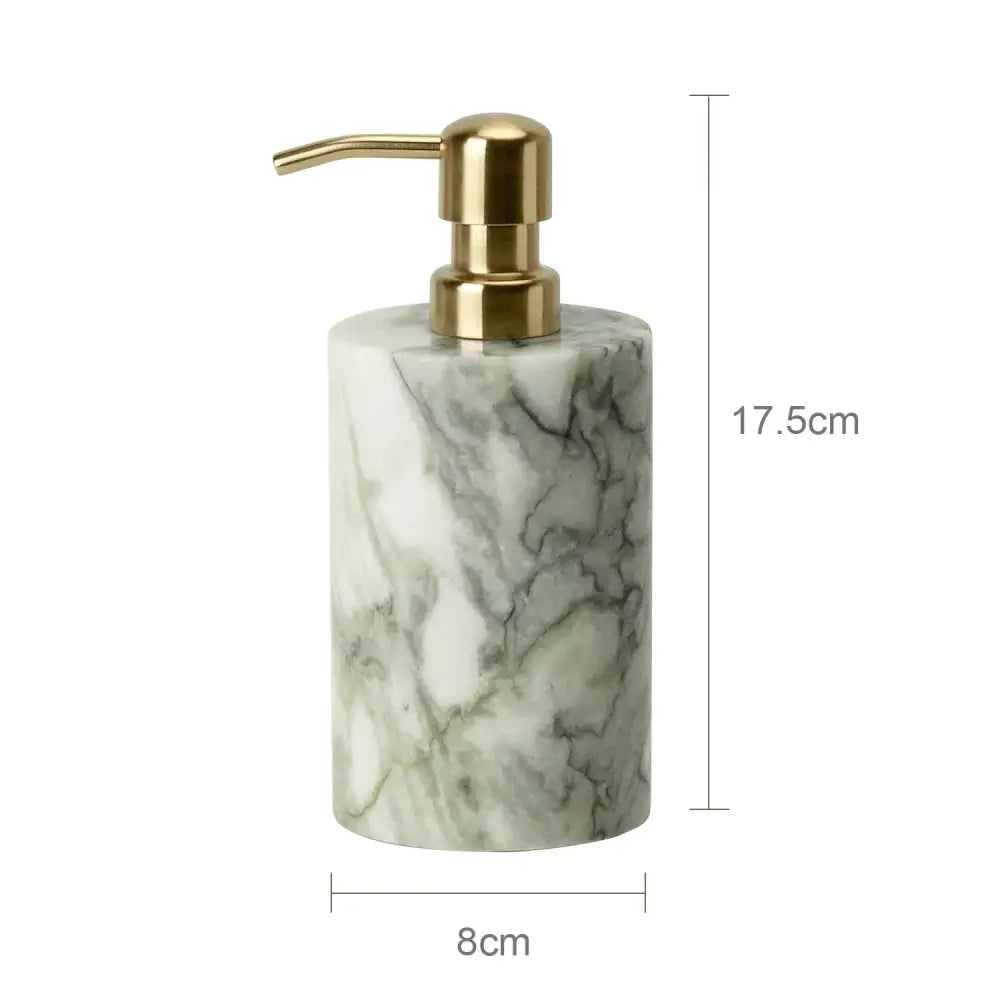 A sleek cylindrical soap dispenser with white and gray marble body and gold pump from emerald marble bathroom set