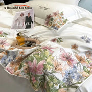 Luxury white satin bedding set with delicate pink peach and blue cotton flowers embroidery in egyptian cotton material