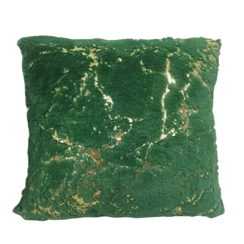 Deep green velvet cushion cover with distressed gold marble pattern complementing decorbites golden fur cushion