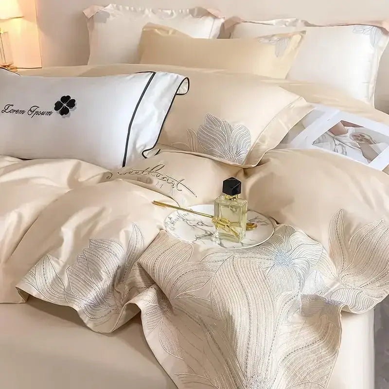 Luxury white and silver embroidered cotton bedding set with cream satin and decorbites embroidered cotton details