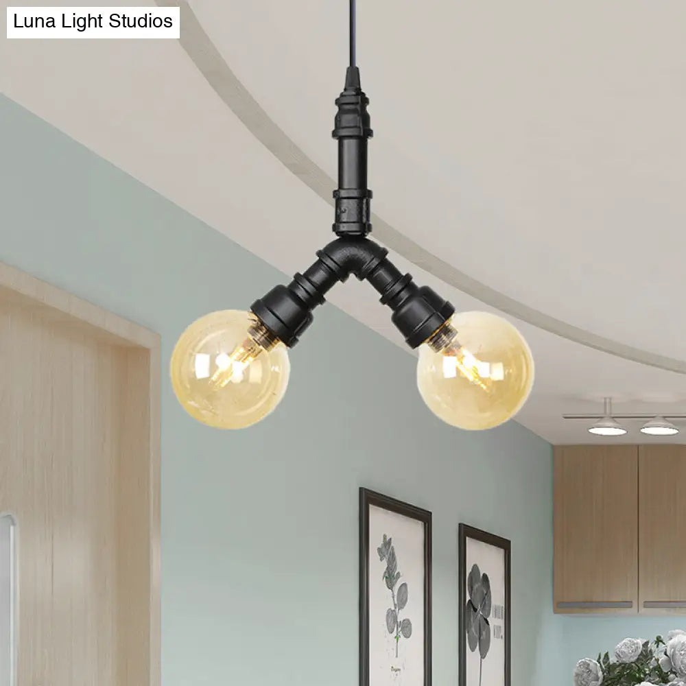 Maasym - Antiqued 2/3/4-Bulb Chandelier Antiqued Coffee House LED Ceiling Pendant Light with Sphere Amber Glass Shade in Black