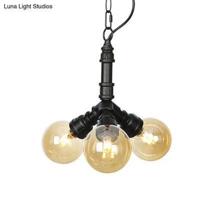 Maasym - Antiqued 2/3/4-Bulb Chandelier Antiqued Coffee House LED Ceiling Pendant Light with Sphere Amber Glass Shade in Black