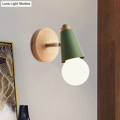 A macaron loft sweet cone pink wall sconce with metal wood base, sage green shade, and exposed frosted bulb for corridors