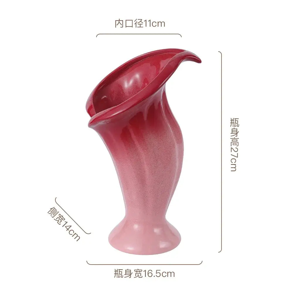 Glossy ceramic vase shaped like a calla lily with magenta gradient from deep red to soft pink for decorbites calla lily decor