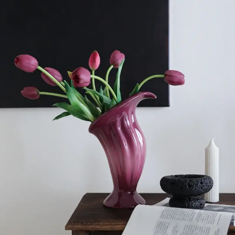 Glossy magenta ceramic vase with flared sculpted neck and pedestal base for decorbites calla lily living room decor