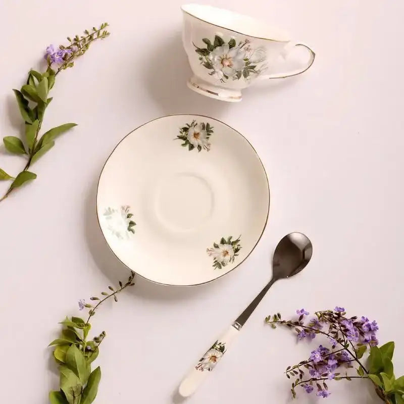 White bone china tea cup set with magnolia floral decorbites bone china pattern and gold trim for elegant dining room decor