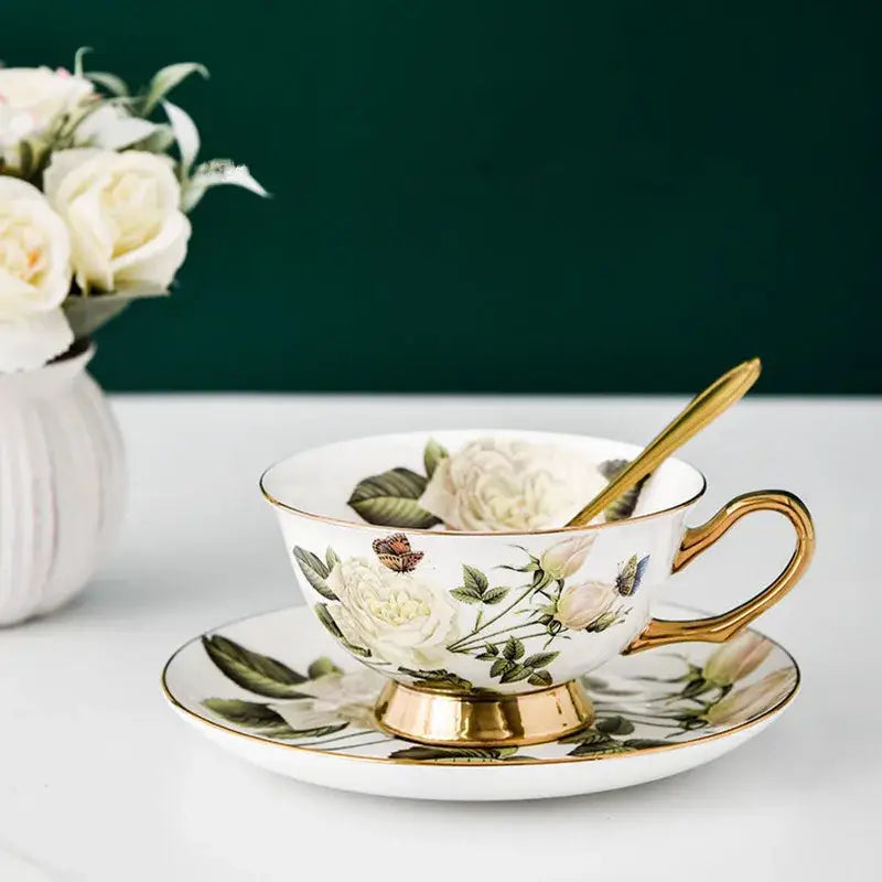 Elegant white bone china tea cup set with gold trim and magnolia floral decorbites bone china design for dining room use
