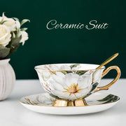 White bone china tea cup set with gold trim featuring magnolia floral design by decorbites bone china for dining room decor
