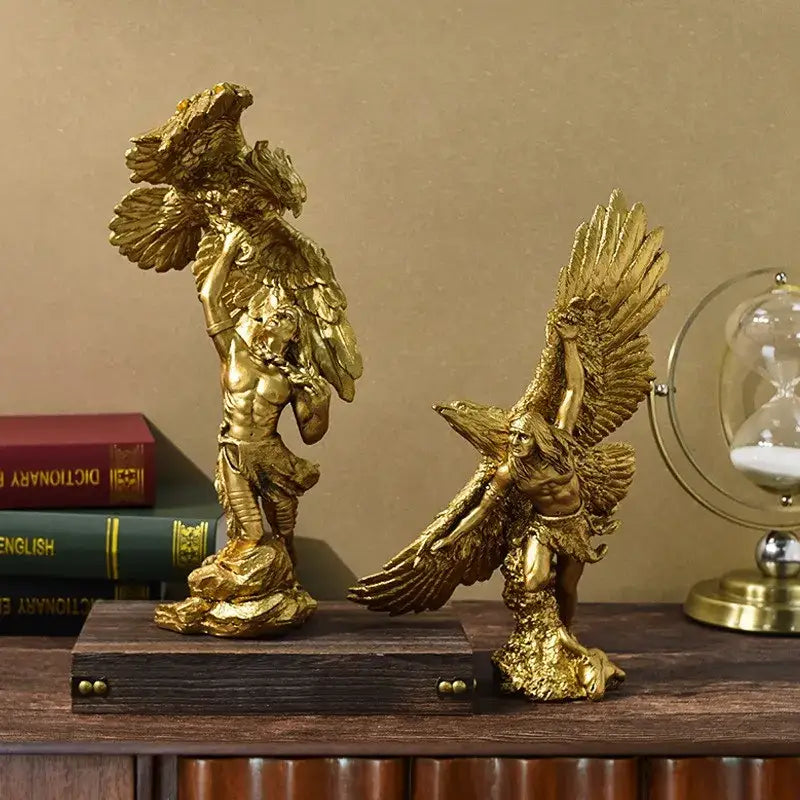 Gold resin eagle figurines with detailed wings and muscular forms crafted from metallic resin for living room decor