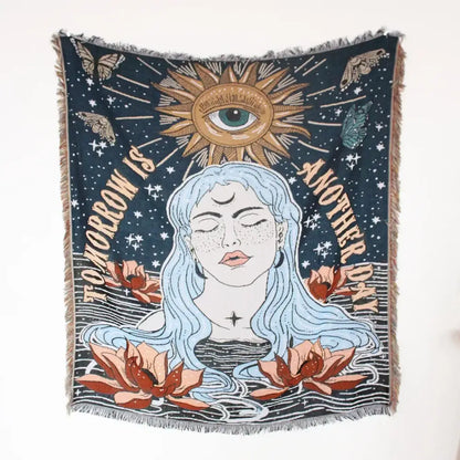 Dark blue woven mandala black geo tassel picnic mat and sofa cover featuring woman with light blue hair and lotus design