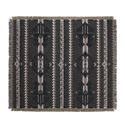Mandala black geo tassel picnic mat and sofa cover featuring black and beige woven tribal patterns with fringed edges