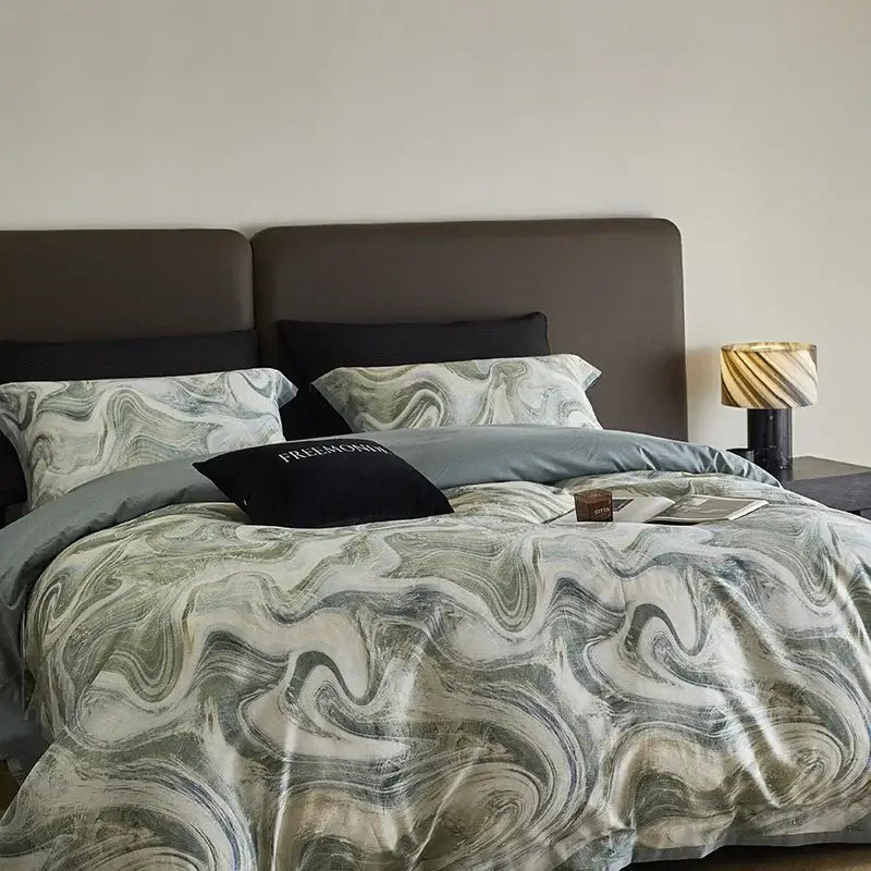 The decorbites 100s egyptian cotton bedding set features a marble gray and teal duvet cover with an abstract marble pattern