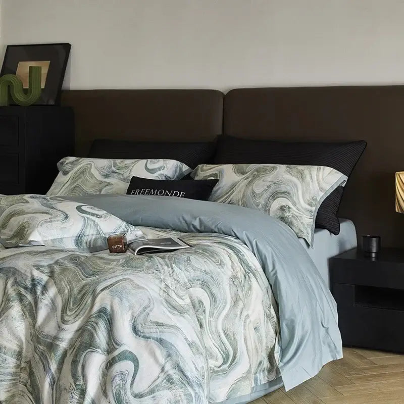 The marble gray and teal bedding set features a flowing pattern on soft decorbites 100s egyptian cotton fabric