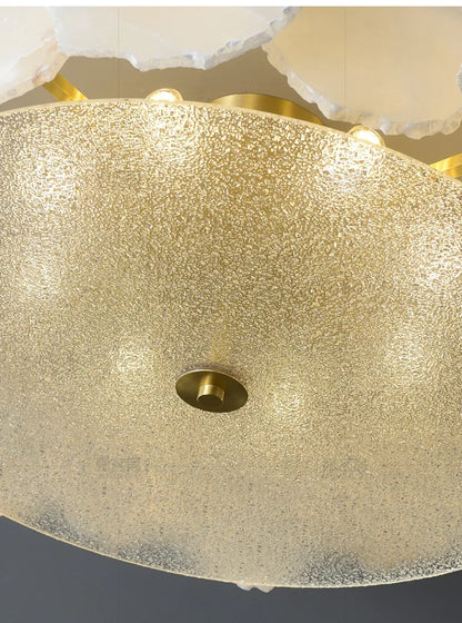Gold-toned marble led chandelier round pendant light with textured frosted speckled glass and brass hardware