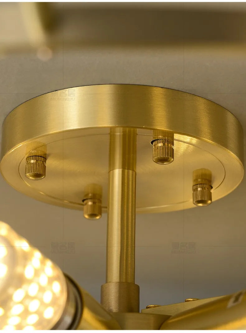 Brass-finished marble led chandelier pendant light with circular base and central stem for modern interiors