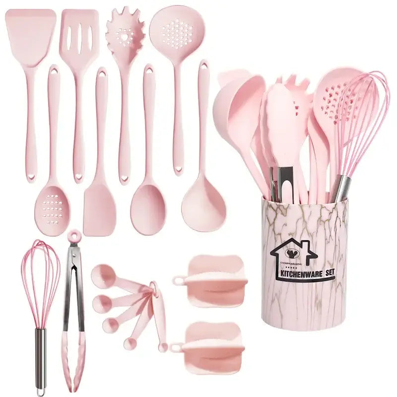 Pink silicone cooking tool set with marble-patterned storage container for kitchen organization and use
