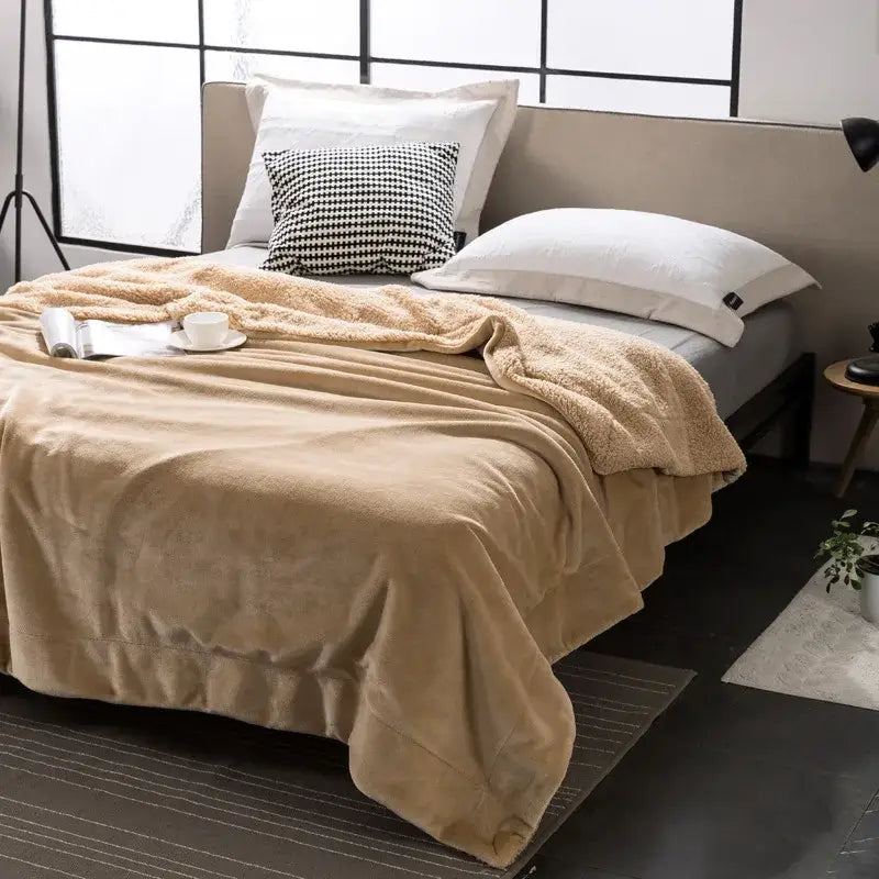 Beige decorbites cozy plush sherpa throw blanket draped over bed for warm and stylish bedroom decor