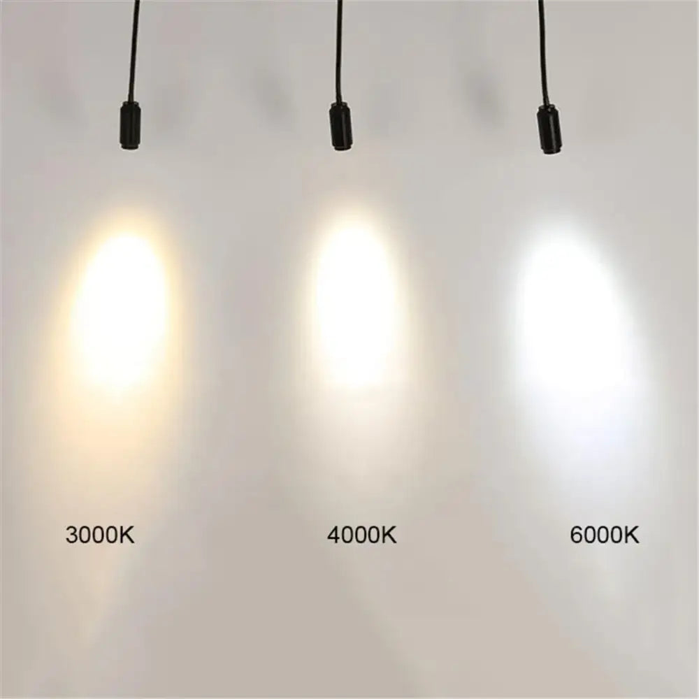 Matte black adjustable beam track light with three pendant lights showing warm 3000k, neutral 4000k, and cool 6000k white decorbites adjustable beam