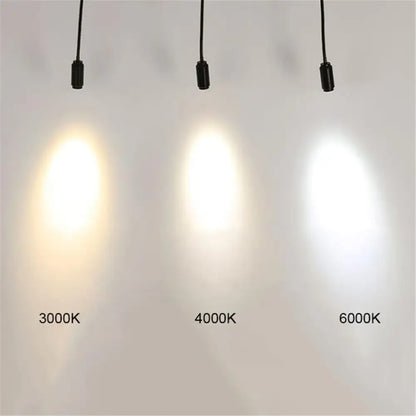 Matte black adjustable beam track light with three pendant lights showing warm 3000k, neutral 4000k, and cool 6000k white decorbites adjustable beam