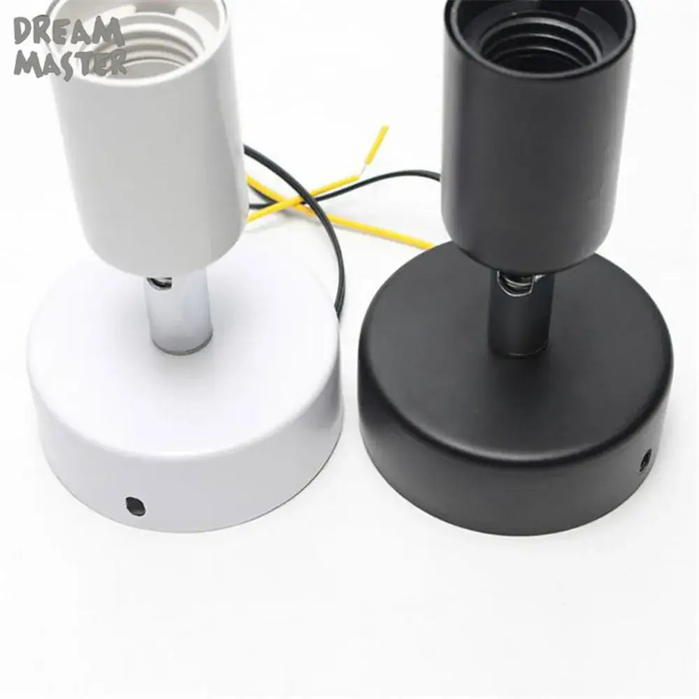 Two minimalist pendant light fixtures in matte white and black with cylindrical sockets for decorbites adjustable led track spotlight
