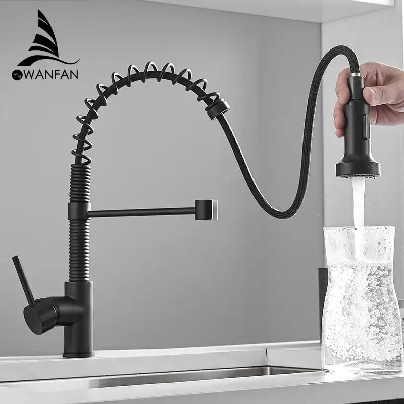 Matte black and brass kitchen faucet with pull-down spring spout and coiled flexible hose from decorbites brush brass kitchen line