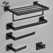 Matte black bathroom accessories set featuring a black matte metal towel rack and matching hooks for decorbites black bathroom