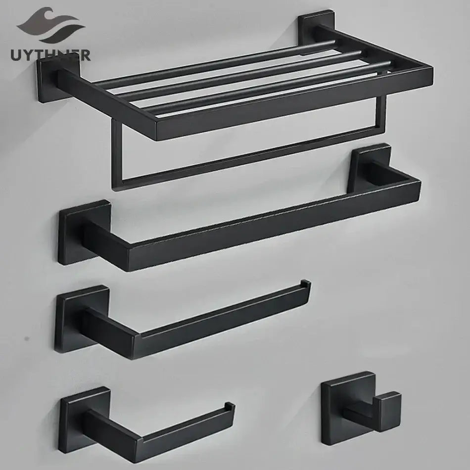 Matte black bathroom accessories set featuring a black matte metal towel rack and matching hooks for decorbites black bathroom