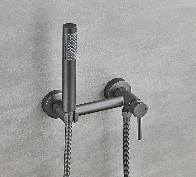 Matte black bidet faucet set with a modern matte black faucet and textured spray head for bathroom use