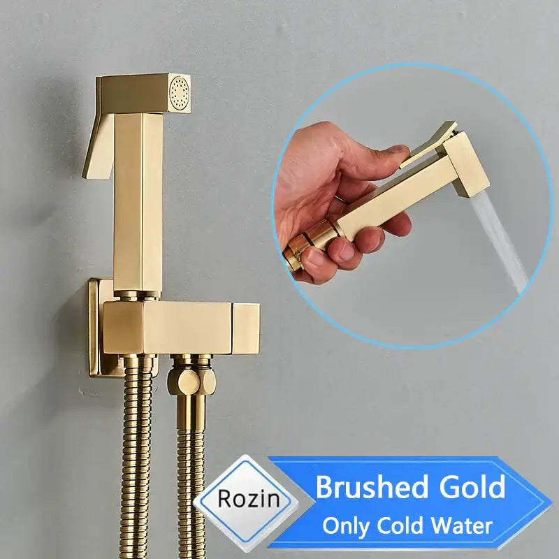 Brushed gold handheld bidet sprayer with sleek modern design and flexible hose featured with black bidet faucet decorbites