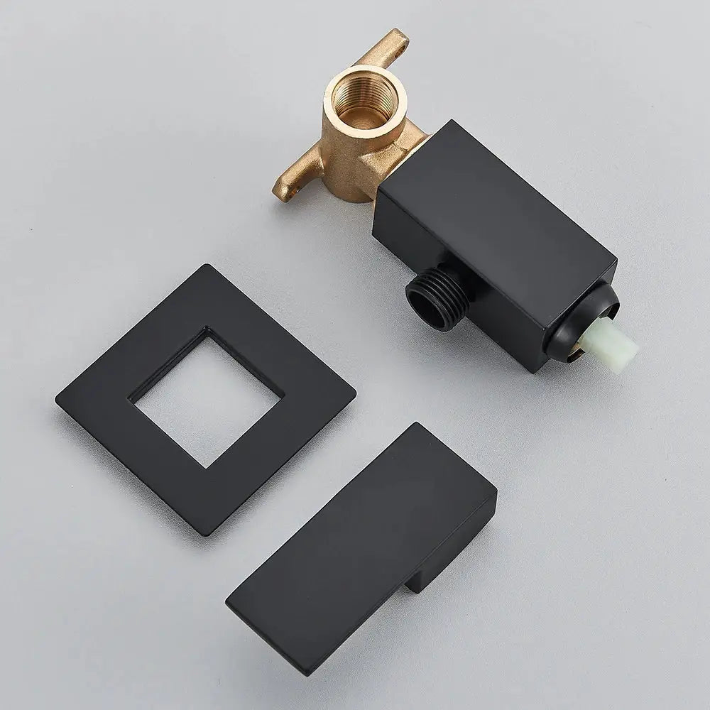 Matte black bidet faucet with handheld sprayer and brass valve featuring square components for modern bathroom use