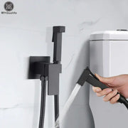 Matte black brass bidet faucet with handheld spray and flexible hose for bathroom decorbites brass bidet use