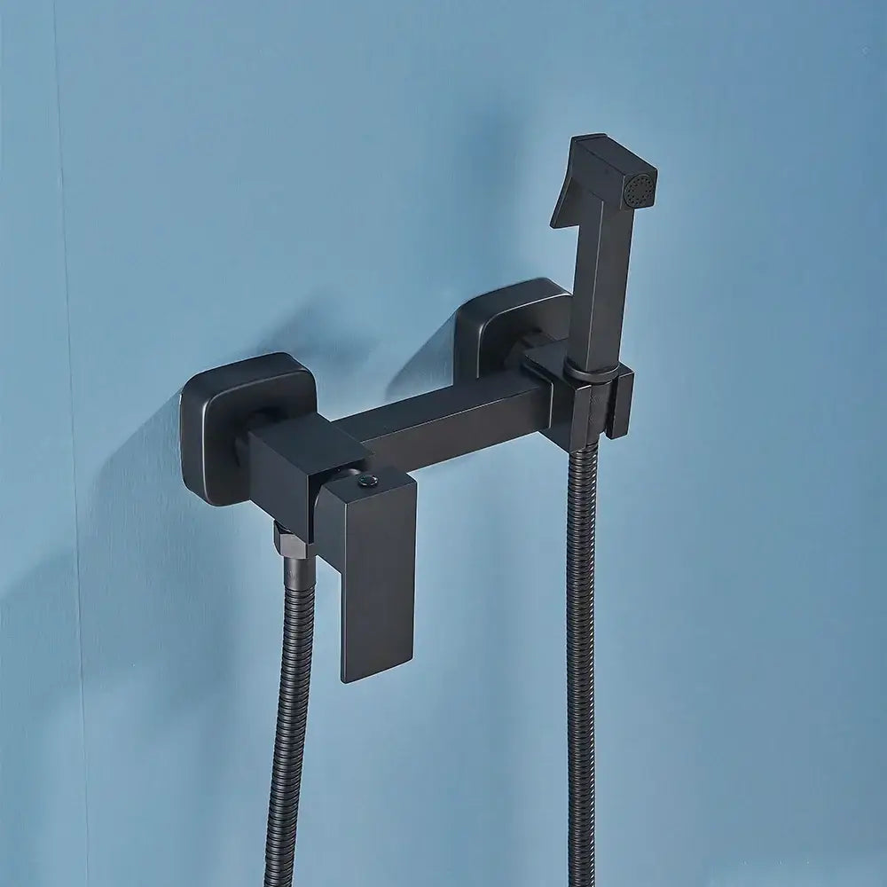 Matte black brass bidet sprayer with modern shower faucet and integrated handheld sprayer for bathroom use