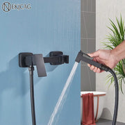 Matte black brass bidet sprayer with sleek rectangular wall-mounted shower faucet and flexible hose for bathroom use