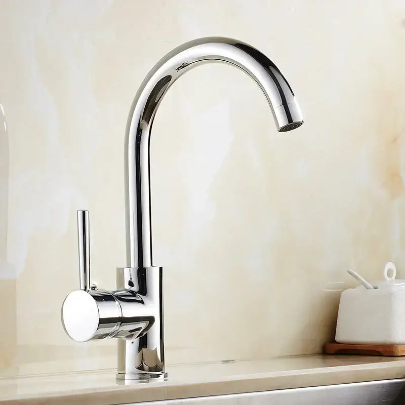 Matte black brass kitchen faucet with curved swivel spout and chrome finish single-handle design from decorbites brass kitchen