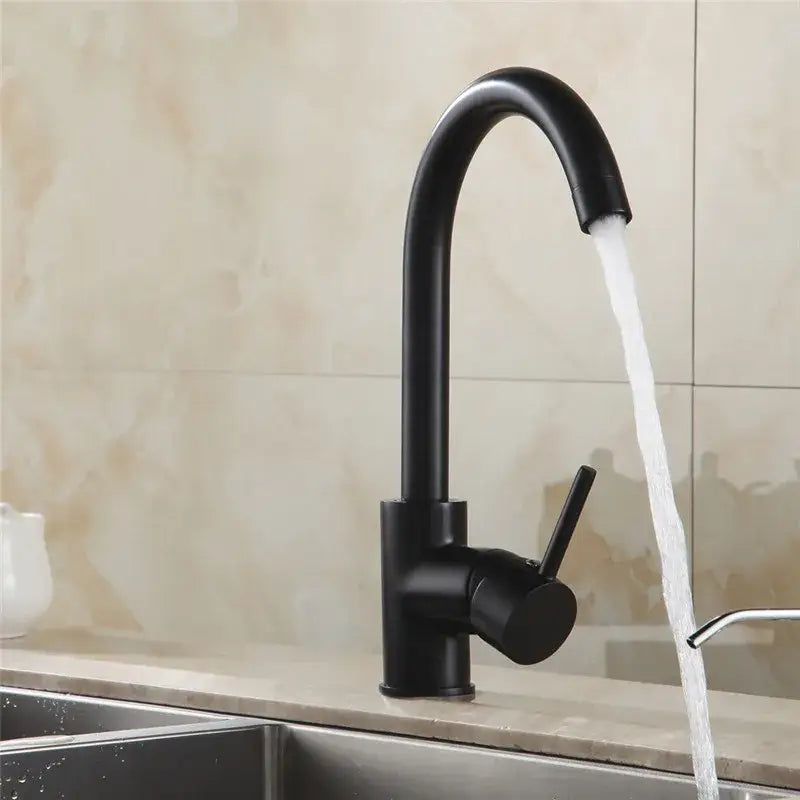 Matte black brass kitchen faucet with curved swivel spout and sleek minimalist design for modern kitchen decorbites brass kitchen
