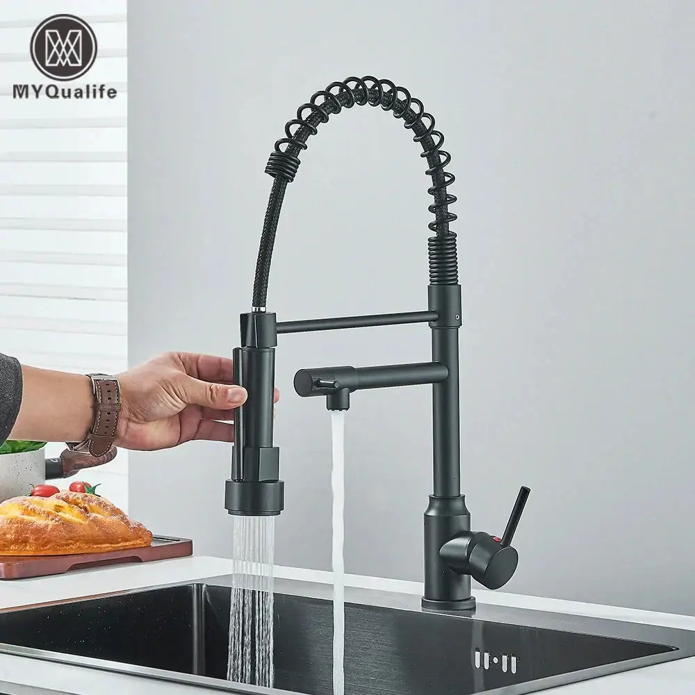 Matte black brass kitchen sink faucet with flexible coiled gooseneck spout and pull down spray head by decorbites brass kitchen