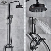 Matte black uythner shower faucet set with bronze accents featuring large overhead rainhead and handheld spray head