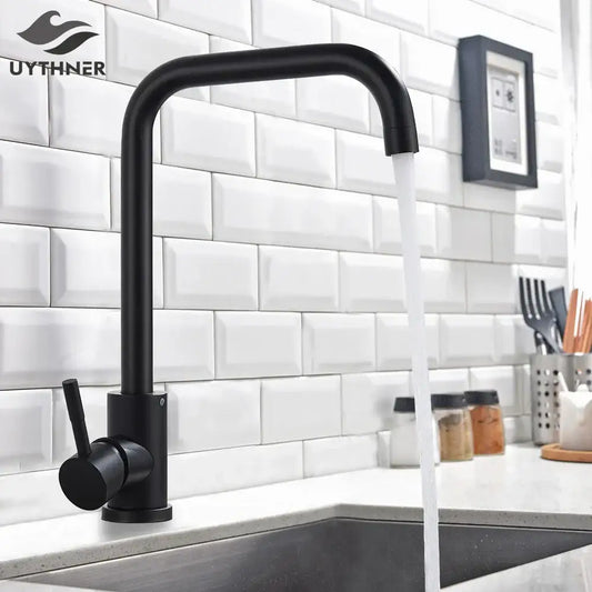 Matte black decorbites kitchen faucet with curved spout and single lever handle in brushed nickel finish