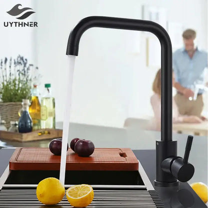 Matte black decorbites kitchen faucet with curved spout and single lever handle in a modern kitchen faucet design